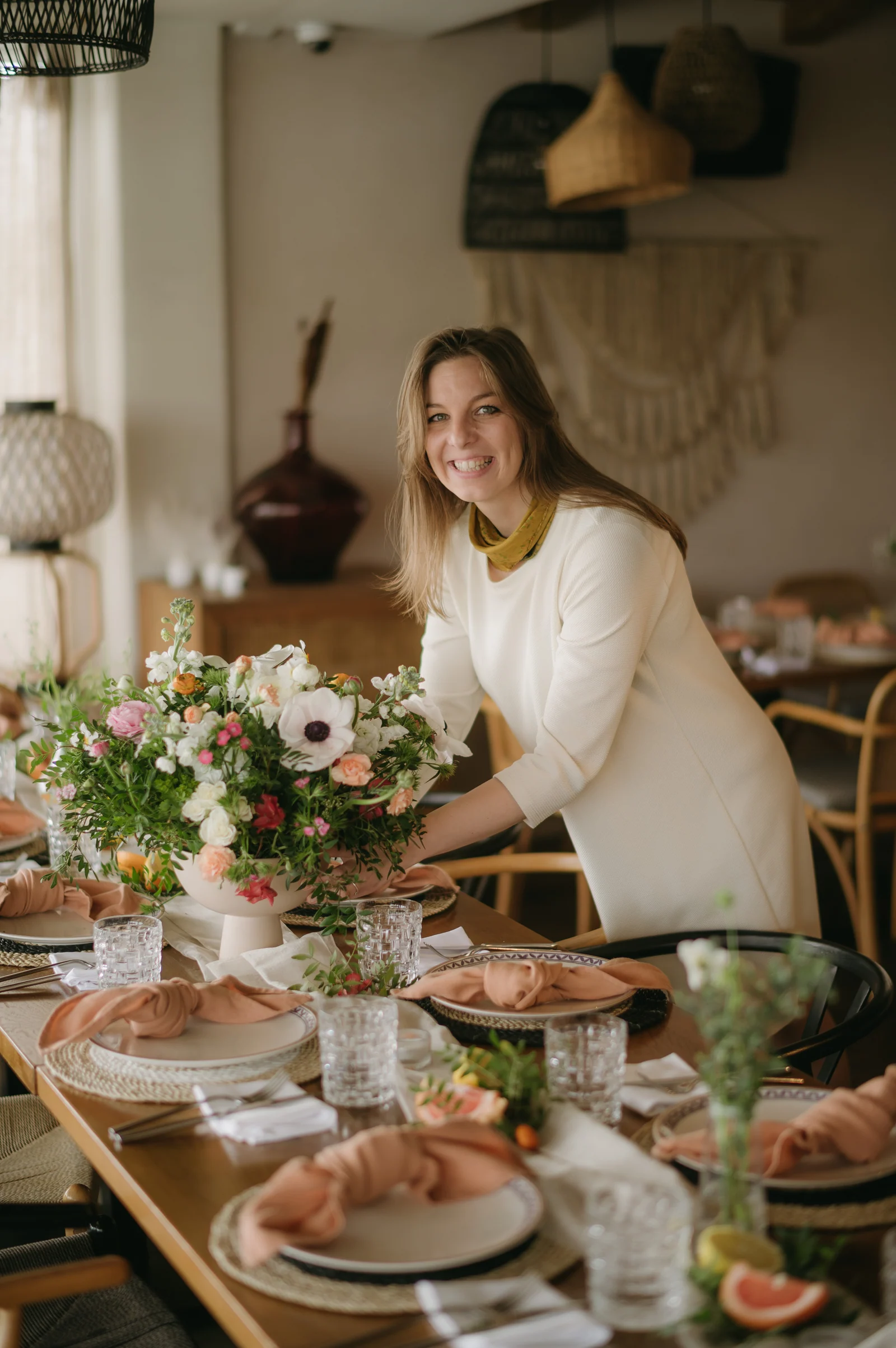 Katarina arranging flowers for an event