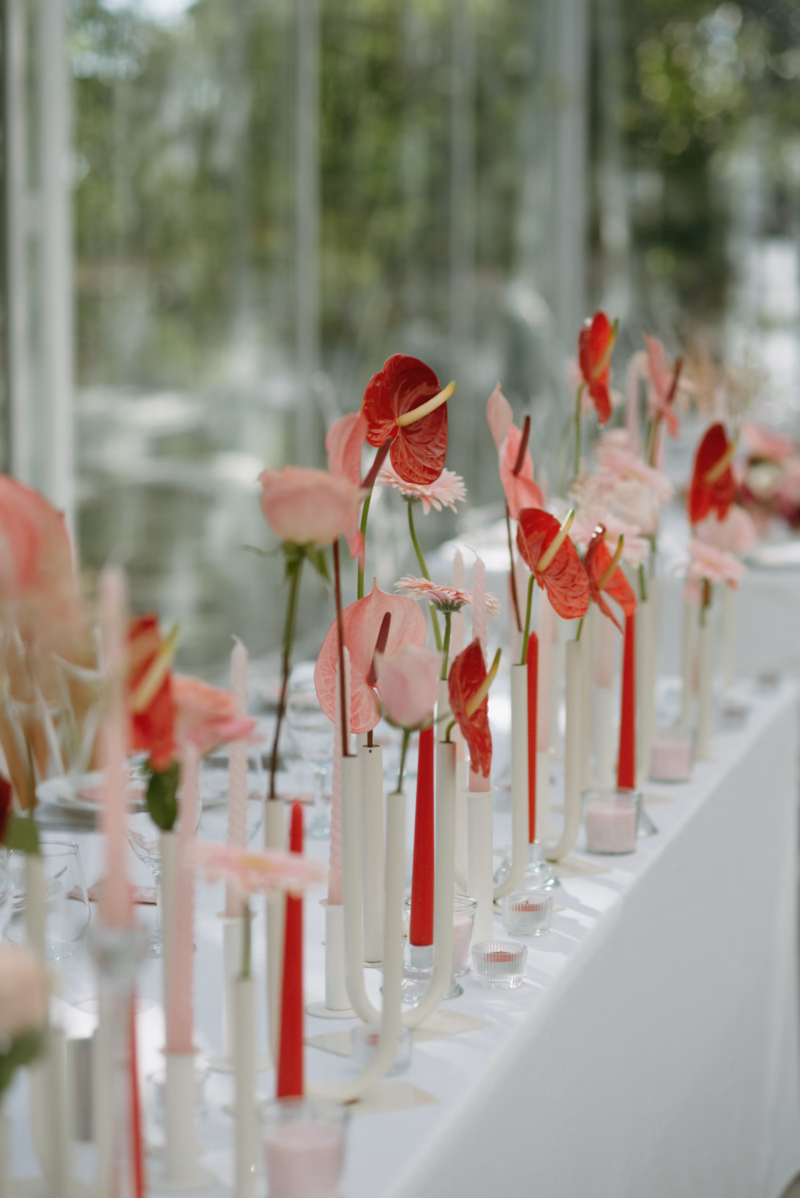 Floral arrangements and candlelight at a wedding reception