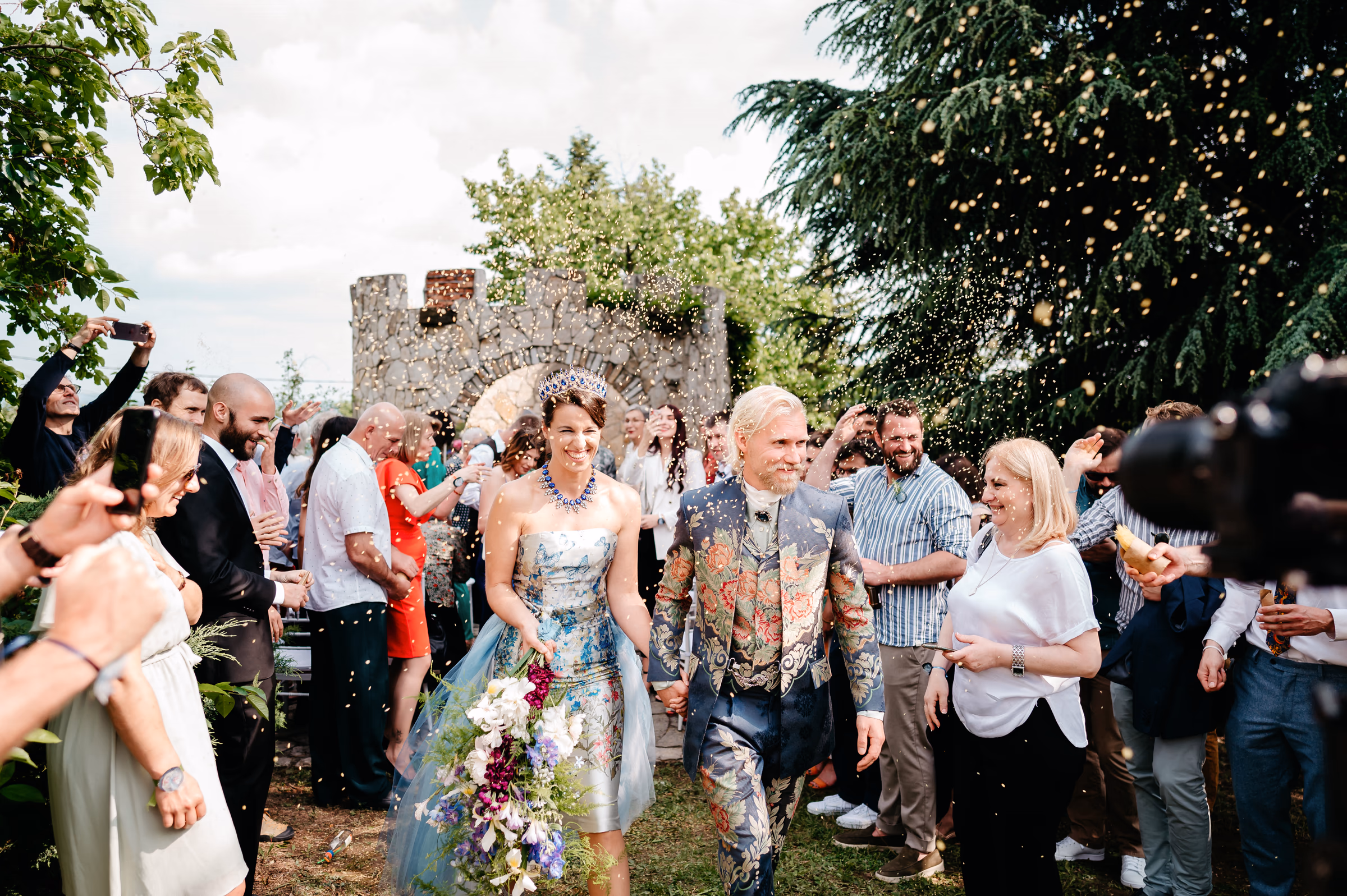 Newlyweds celebrating beneath a shower of confetti